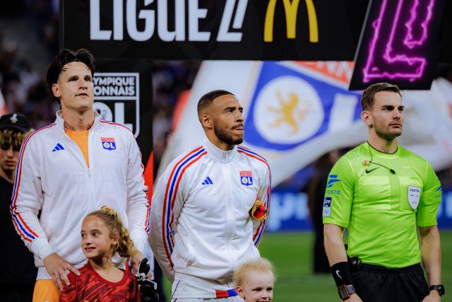 Corentin Tolisso aux côtés de Rémi Descamps. © Radio SCOOP ? Pauline Figuet